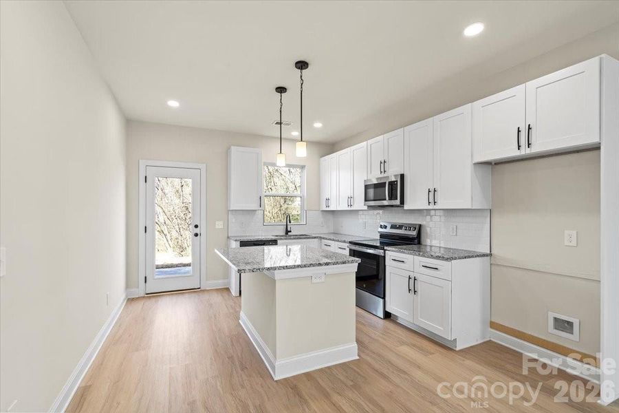 Furnished interior view inside a new home in , Hickory (Image 5).