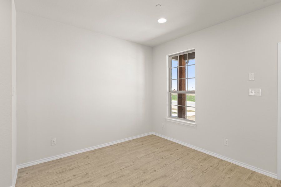 Front exterior of a new home in Sanger Circle, Sanger, TX, highlighting curb appeal (Image 5). Front exterior of a new home in Sanger Circle, Sanger, TX, highlighting curb appeal (Image 5).