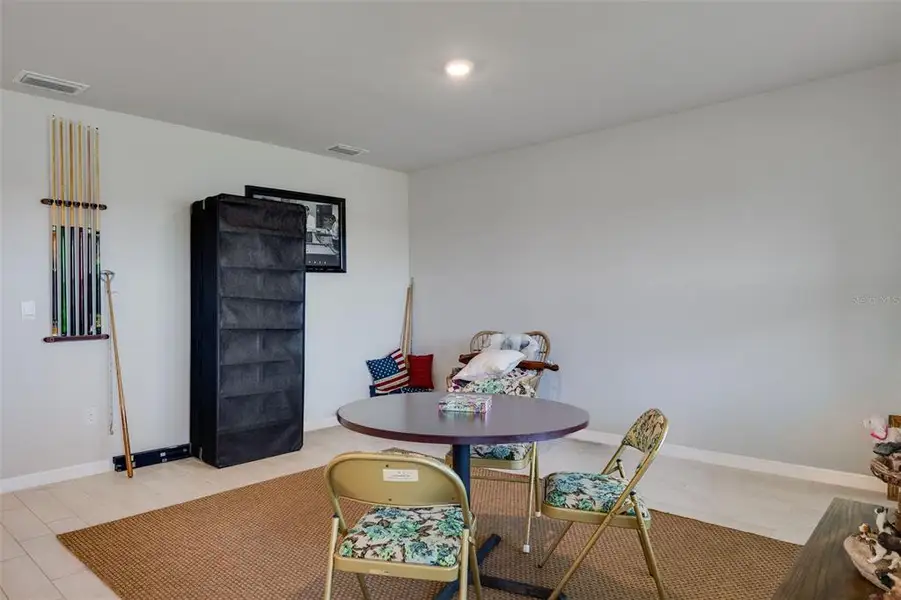 Furnished interior view inside a new home in Coral Bay - Express & Tradition, North Fort Myers (Image 9).
