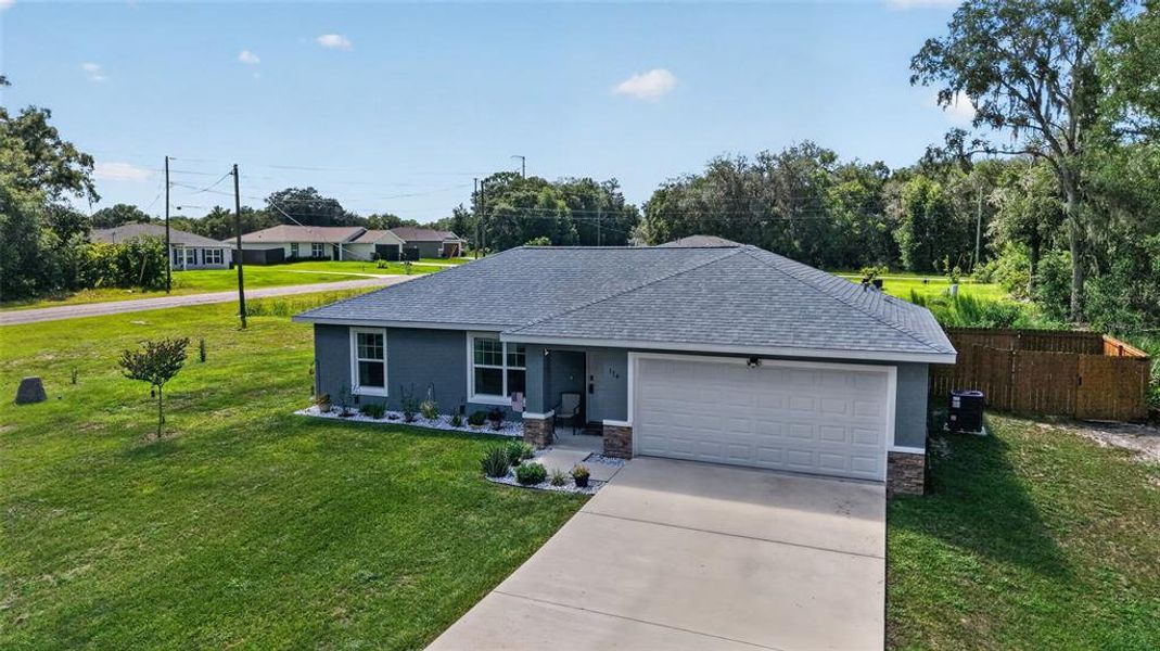 Front exterior of a new home in , Ocala, FL, highlighting curb appeal (Image 25). Front exterior of a new home in , Ocala, FL, highlighting curb appeal (Image 25).