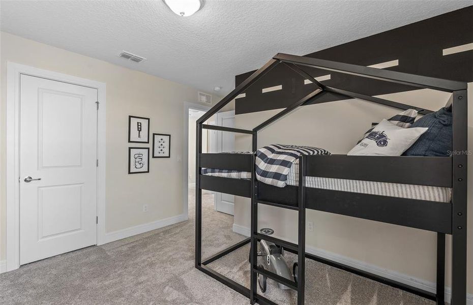 Furnished interior view inside a new home in Tohoqua, Kissimmee (Image 33).