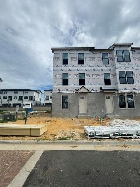 In-progress construction of a new home in Parkview at Hamlin, Winter Garden, FL (Image 42).