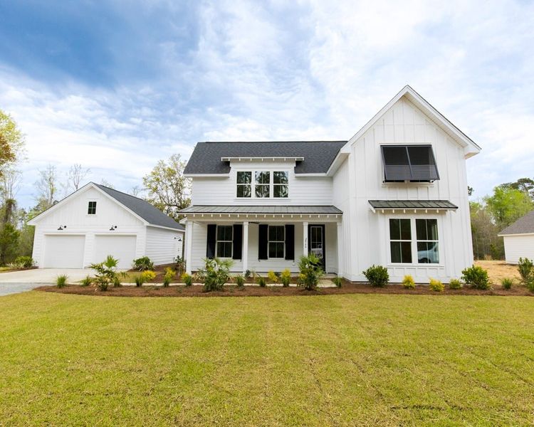 Representative exterior photo of a completed home built from the The Roxy by New Leaf Builders in Vineyard Lakes, Johns Island, SC (Image 1). Representative exterior photo of a completed home built from the The Roxy by New Leaf Builders in Vineyard Lakes, Johns Island, SC (Image 1).