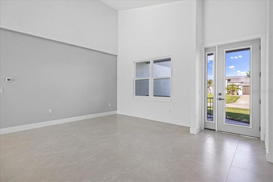 Spacious, unfurnished interior of a new home in , Port Charlotte (Image 27).