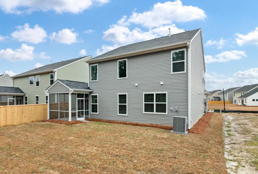 Exterior details and patio area of a home in Oakley Pointe, Moncks Corner (Image 26).