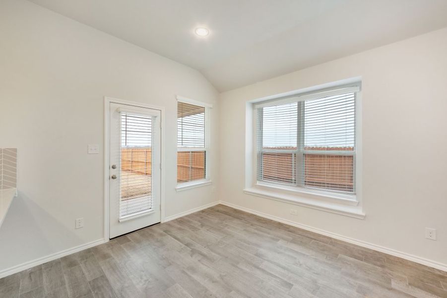 Representative exterior photo of a completed home built from the Joliet by Impression Homes in Heartland, Heartland, TX (Image 14).