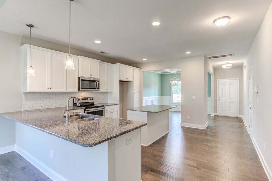 Representative furnished interior of a home built from the Rivermist by Caviness & Cates Communities in Maggie Way, Wendell (Image 177).