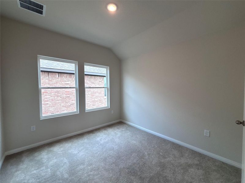 Spacious, unfurnished interior of a new home in The Colony, Bastrop (Image 14).