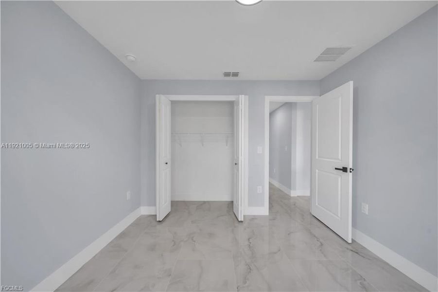 Spacious, unfurnished interior of a new home in , Lehigh Acres (Image 24). Spacious, unfurnished interior of a new home in , Lehigh Acres (Image 24).