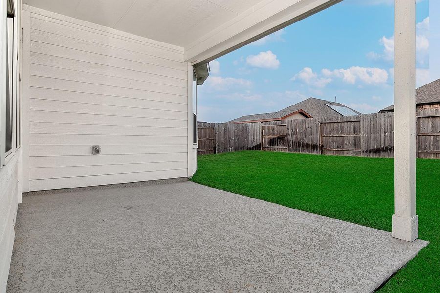 Front exterior of a new home in Mavera, Conroe, TX, highlighting curb appeal (Image 21).