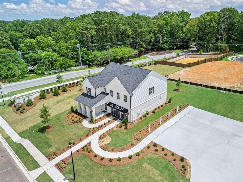 Front exterior of a new home in Oak Grove Glen, Snellville, GA, highlighting curb appeal (Image 24). Front exterior of a new home in Oak Grove Glen, Snellville, GA, highlighting curb appeal (Image 24).
