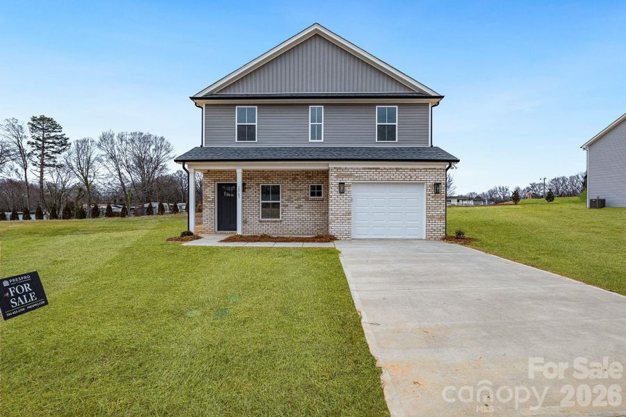 Front exterior of a new home in , Rock Hill, SC, highlighting curb appeal (Image 1). Front exterior of a new home in , Rock Hill, SC, highlighting curb appeal (Image 1).