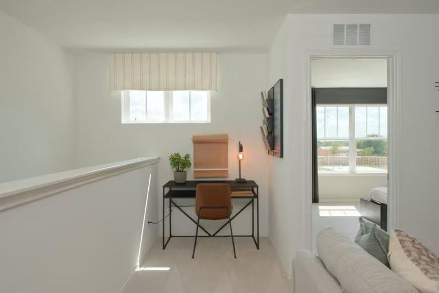 Photo of Pulte model home with same floor plan, not of actual home listed. Photo of Pulte model home with same floor plan, not of actual home listed.