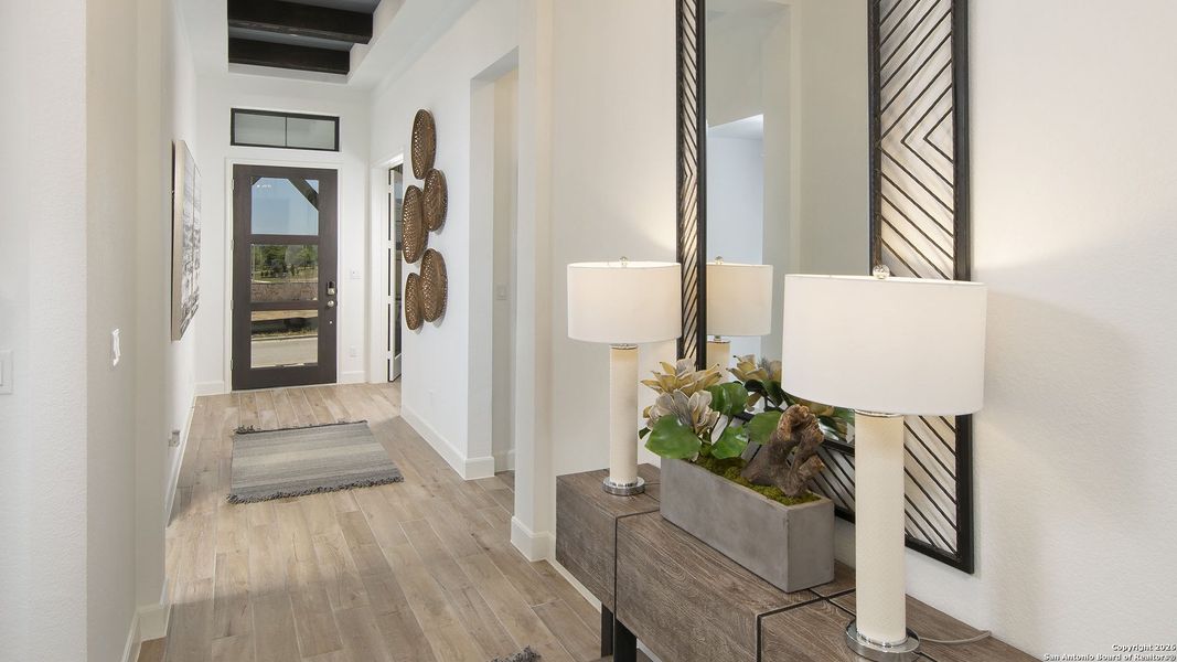 Furnished interior view inside a new home in Vida 50', San Antonio (Image 7).