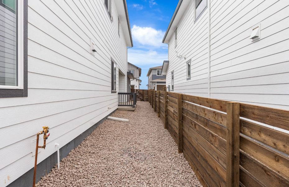 Exterior details and patio area of a home in Barefoot Village, Firestone (Image 27). Exterior details and patio area of a home in Barefoot Village, Firestone (Image 27).