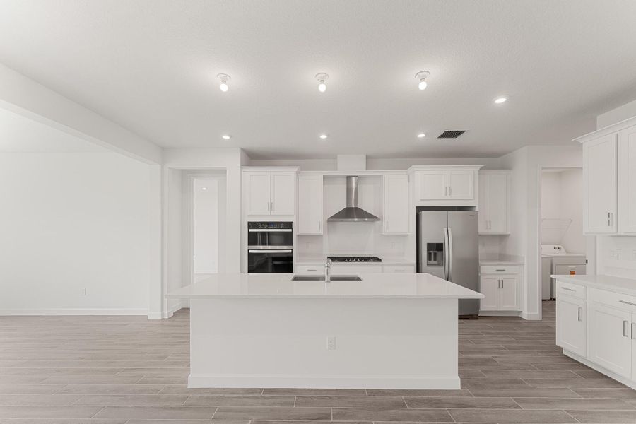 Furnished interior view inside a new home in Tradition - Kenley, Port St. Lucie (Image 6).