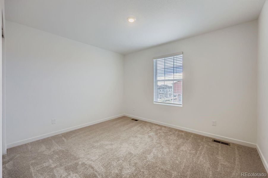 Spacious, unfurnished interior of a new home in Copper Chase: The Celestial Collection, Colorado Springs (Image 12).