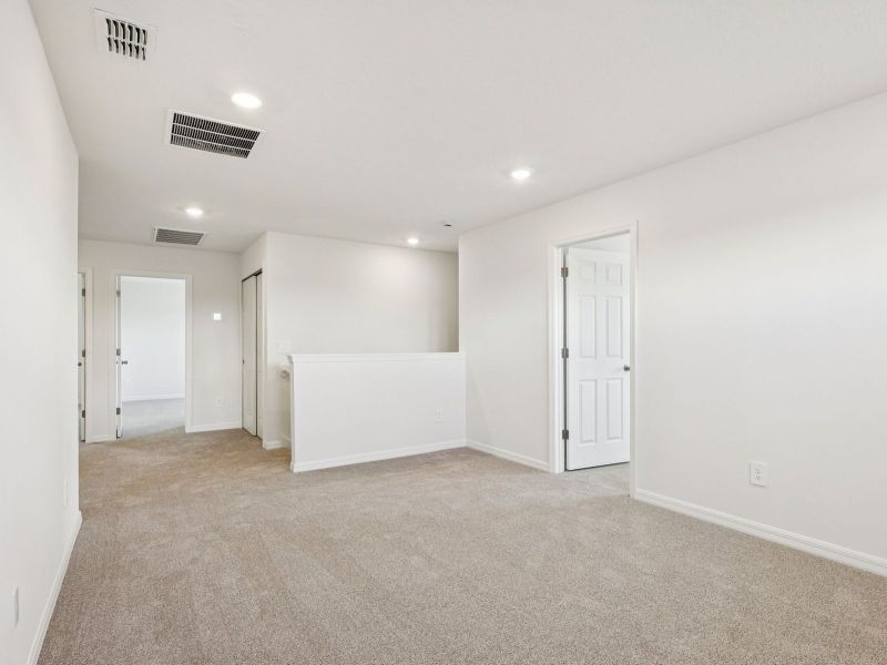 Spacious, unfurnished interior of a new home in The Meadow at Crossprairie, St. Cloud (Image 10).