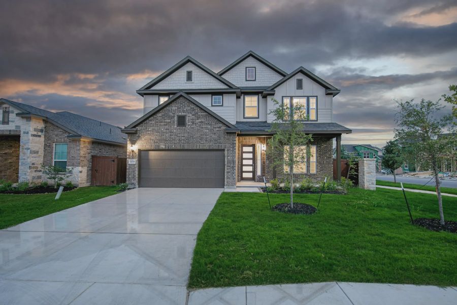 Representative exterior photo of a completed home built from the Brandy by Chesmar Homes in Buffalo Crossing, Cibolo, TX (Image 2).