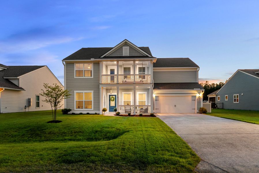 Front exterior of a new home in Sea Island Preserve, Johns Island, SC, highlighting curb appeal (Image 2). Front exterior of a new home in Sea Island Preserve, Johns Island, SC, highlighting curb appeal (Image 2).
