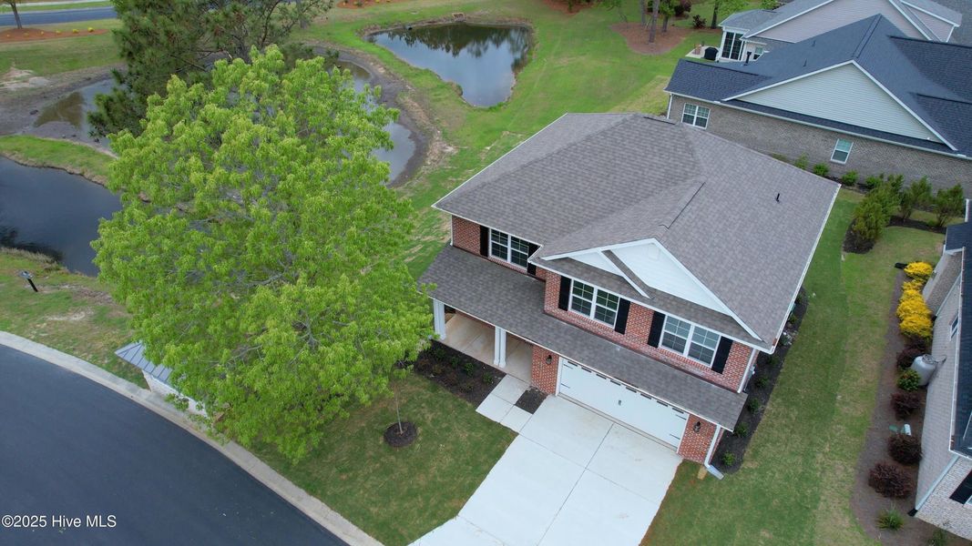 Front exterior of a new home in Palmetto Creek, Bolivia, NC, highlighting curb appeal (Image 16).