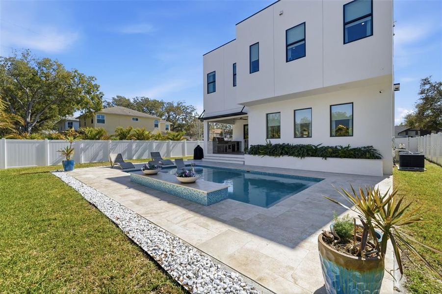 Exterior details and patio area of a home in , Tampa (Image 24).