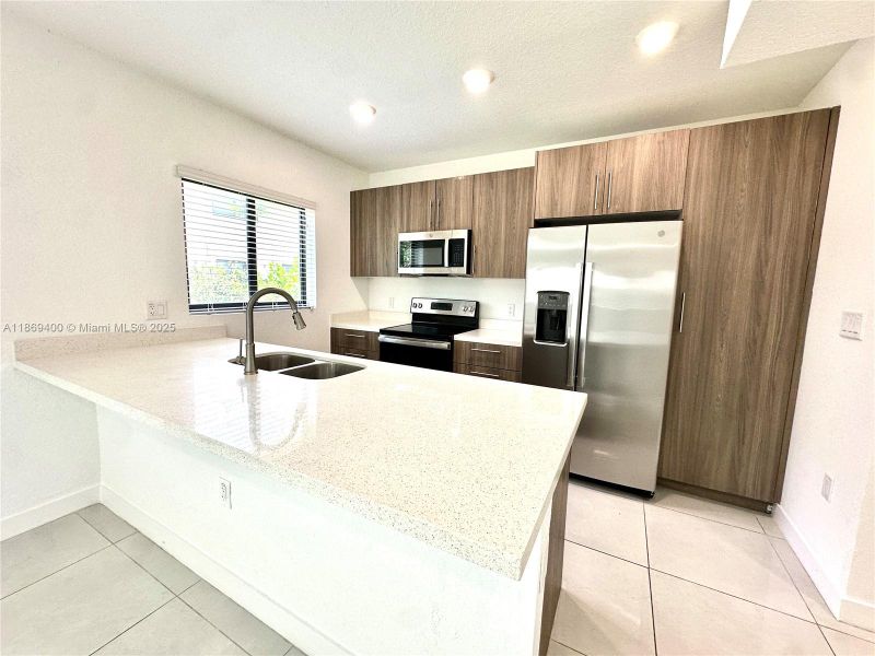 Furnished interior view inside a new home in , Florida City (Image 3).