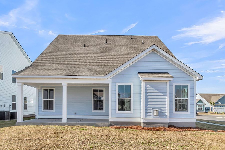 Exterior details and patio area of a home in Tidewater at Lakes of Cane Bay, Summerville (Image 4).