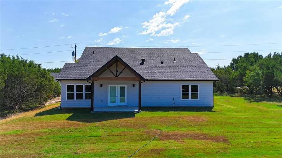 Front exterior of a new home in , Granbury, TX, highlighting curb appeal (Image 1). Front exterior of a new home in , Granbury, TX, highlighting curb appeal (Image 1).