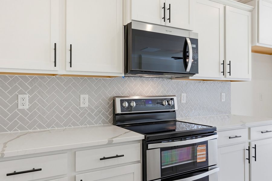 Representative furnished interior of a home built from the Montague II by Great Southern Homes in Oak Hollow, Longs (Image 13).