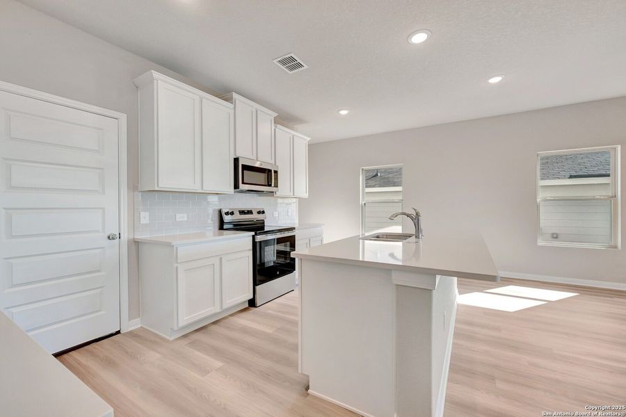 Furnished interior view inside a new home in Paloma Park, Converse (Image 11).