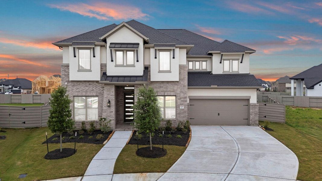 Front exterior of a new home in Pomona, Manvel, TX, highlighting curb appeal (Image 21). Front exterior of a new home in Pomona, Manvel, TX, highlighting curb appeal (Image 21).