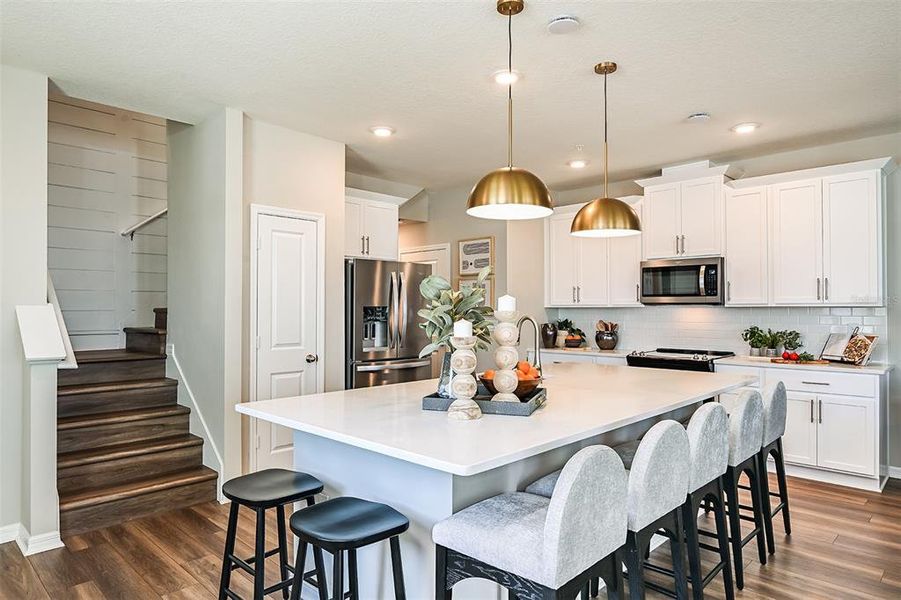 Furnished interior view inside a new home in Towns at Riverwalk: Lake Monroe TH, Sanford (Image 6). Furnished interior view inside a new home in Towns at Riverwalk: Lake Monroe TH, Sanford (Image 6).