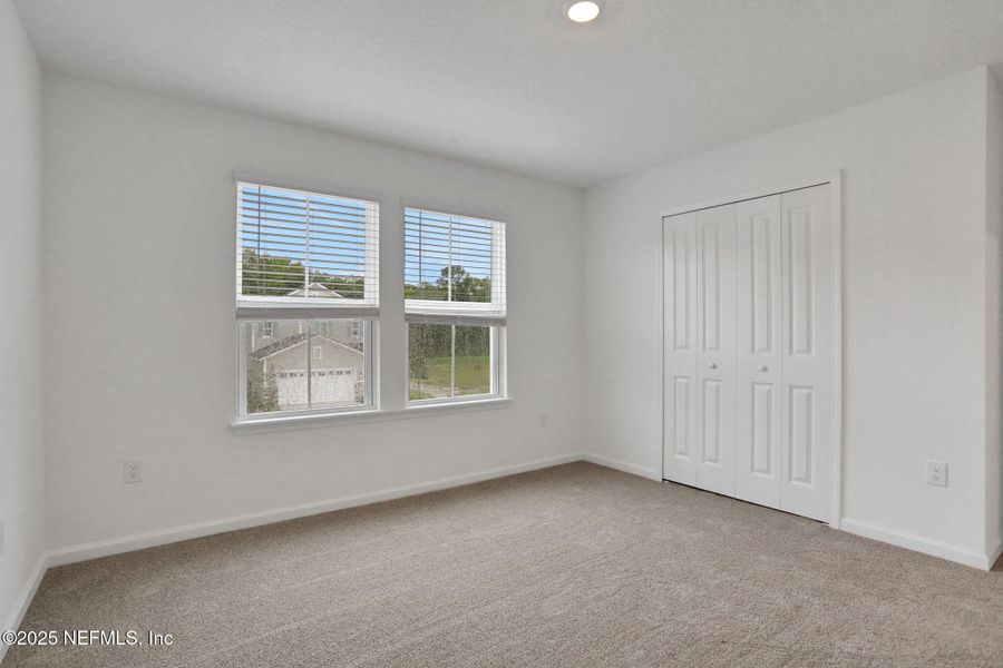 Spacious, unfurnished interior of a new home in TrailMark, St. Augustine (Image 30).