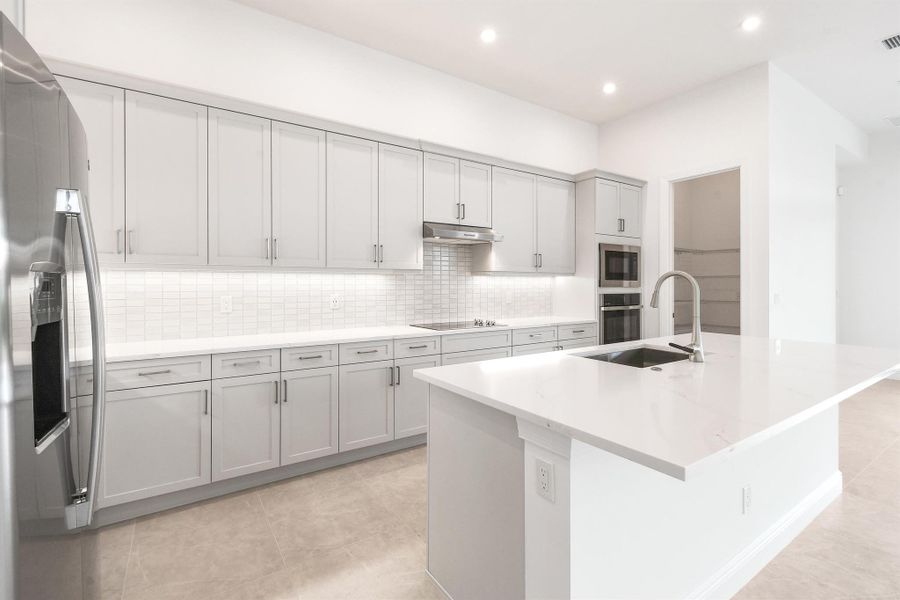 Furnished interior view inside a new home in PGA Village Verano, Port St. Lucie (Image 3).