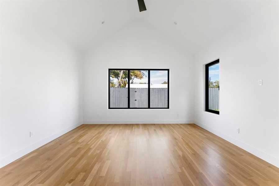 Master Bedroom with natural light, high vaulted ceiling, and ceiling fan Master Bedroom with natural light, high vaulted ceiling, and ceiling fan