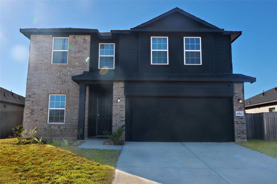 Front exterior of a new home in , Magnolia, TX, highlighting curb appeal (Image 1). Front exterior of a new home in , Magnolia, TX, highlighting curb appeal (Image 1).