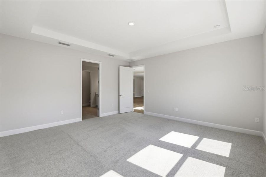 Spacious, unfurnished interior of a new home in Harvest at Ovation, Winter Garden (Image 17).
