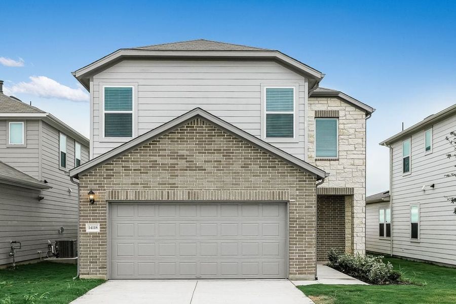 Representative exterior photo of a completed home built from the Kestrel by Taylor Morrison in Stonewall Ranch, Liberty Hill, TX (Image 23).