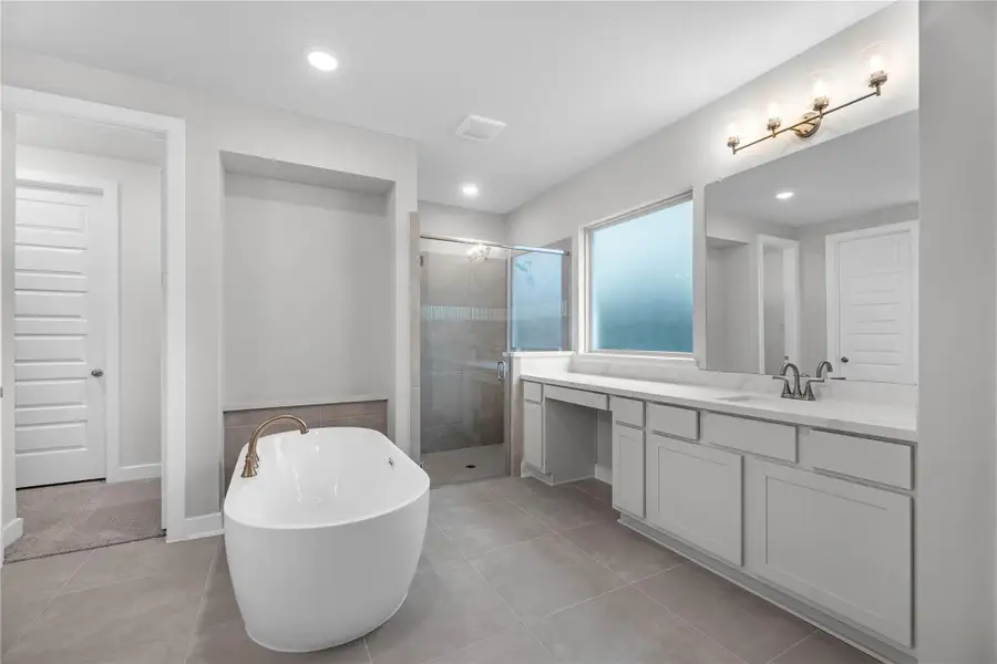 Furnished interior view inside a new home in The Trails - 60', New Caney (Image 4).