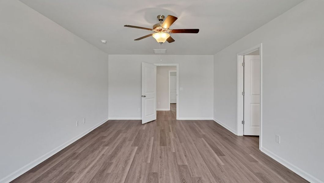 Representative unfurnished interior of a home built from the Hayden by D.R. Horton in Cedar Hill Landing, Navassa (Image 27).