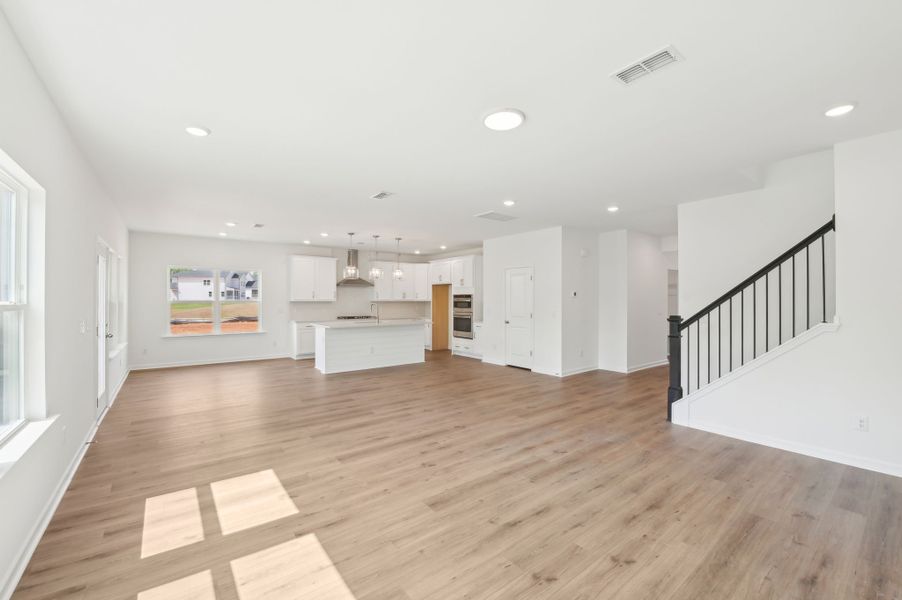 Representative unfurnished interior of a home built from the Alexis by Ashton Woods in Rowland's Grant, Fuquay Varina (Image 28).