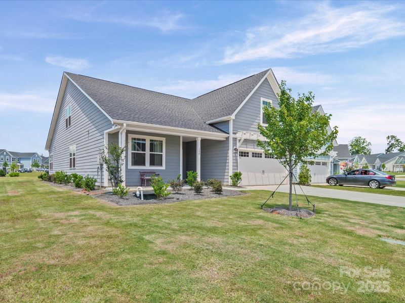 Front exterior of a new home in Tillery Tradition, Mount Gilead, NC, highlighting curb appeal (Image 19).