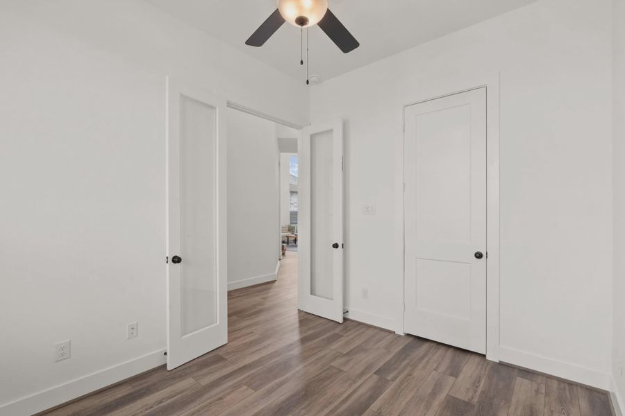 Representative unfurnished interior of a home built from the Viola by Chesmar Homes in Mulberry Farms, Santa Fe (Image 10).