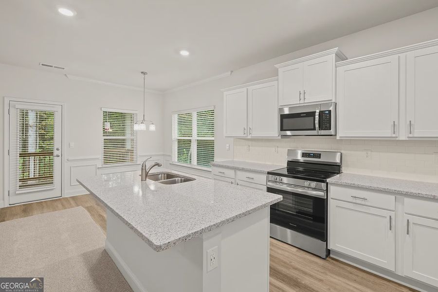 Furnished interior view inside a new home in Canterbury Villas, Carrollton (Image 6).