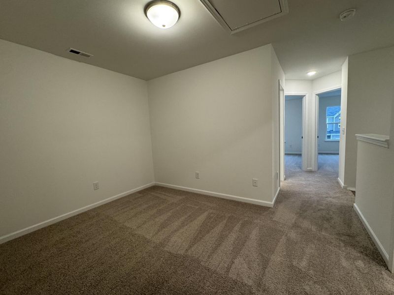 Spacious, unfurnished interior of a new home in East Main Townes, Spartanburg (Image 15).