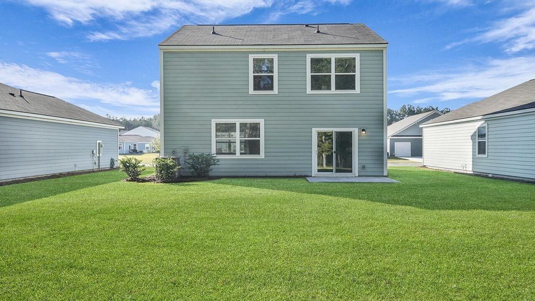Exterior details and patio area of a home in Hillcrest, Ravenel (Image 25).