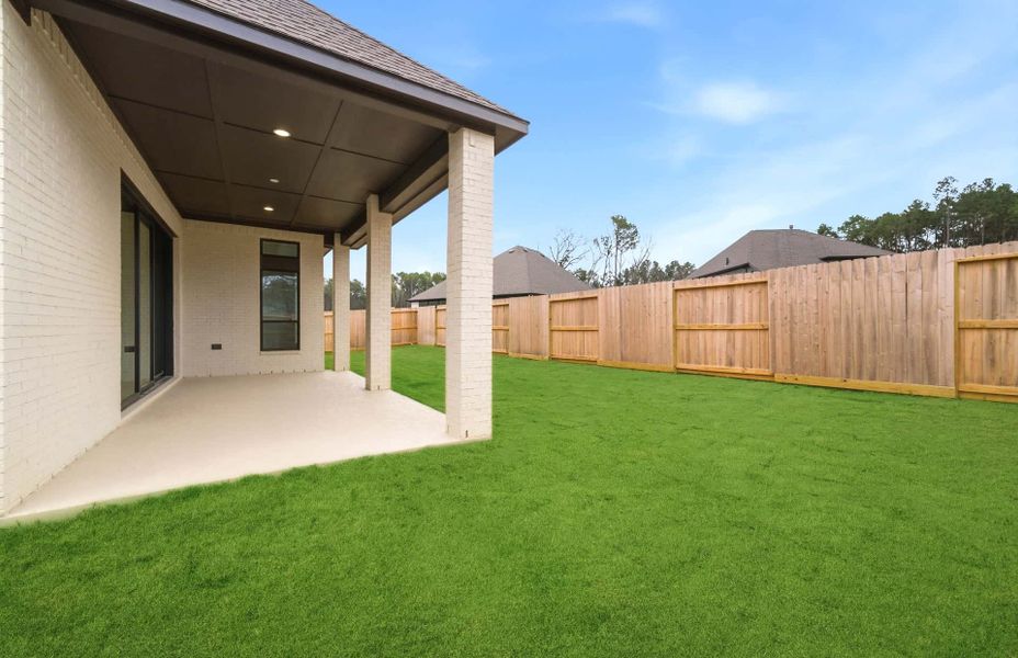 Exterior details and patio area of a home in The Highlands 55′, Porter (Image 3).