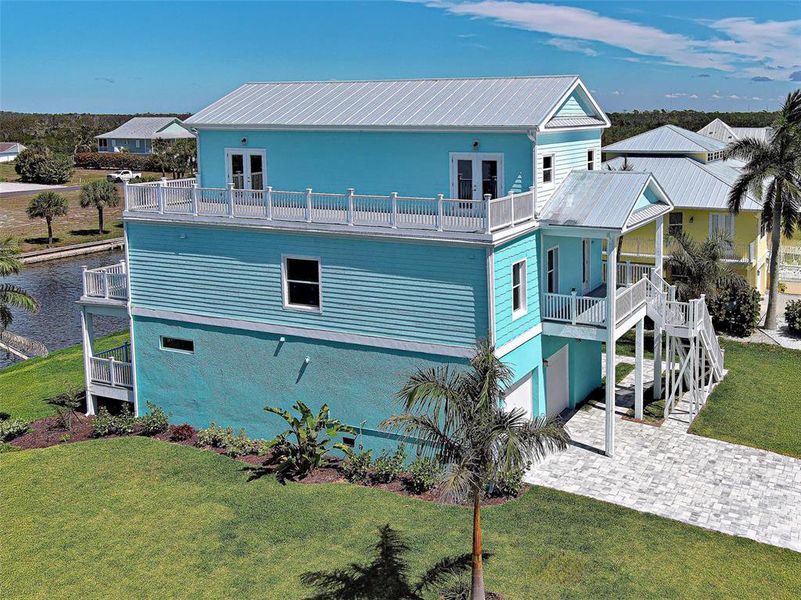 Exterior details and patio area of a home in , Placida (Image 36). Exterior details and patio area of a home in , Placida (Image 36).
