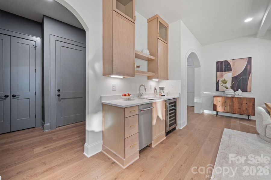 Entertainment station - ice maker - sink - beverage refrigerator - additional cabinets
